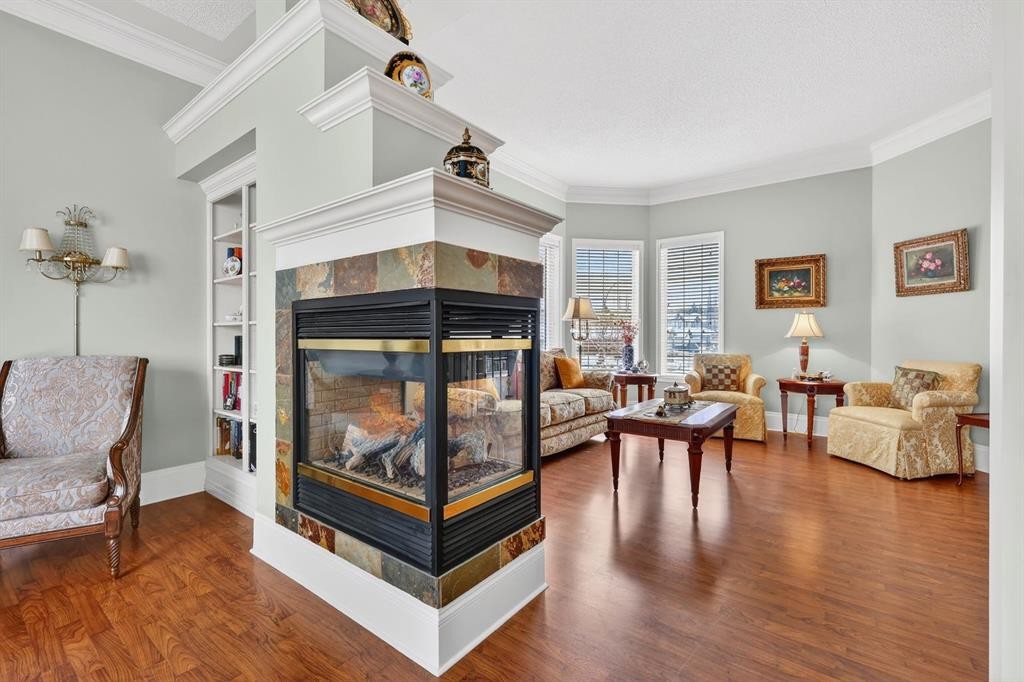 331 Mt Douglas Court Se, Calgary, AB - Indoor Photo Showing Living Room With Fireplace