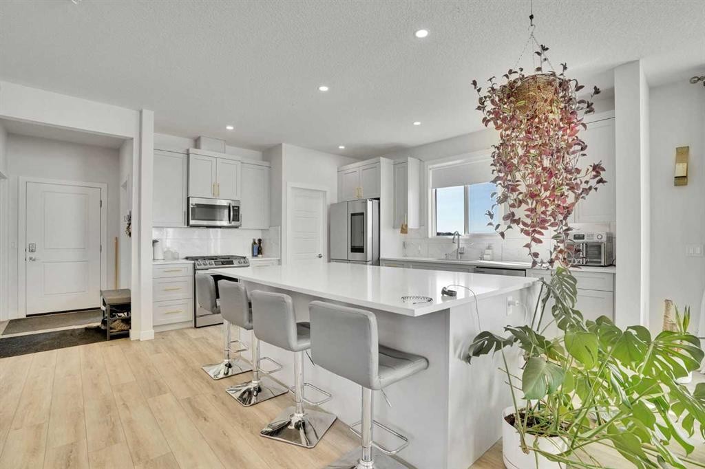 183 Brander Avenue, Langdon, AB - Indoor Photo Showing Kitchen With Upgraded Kitchen