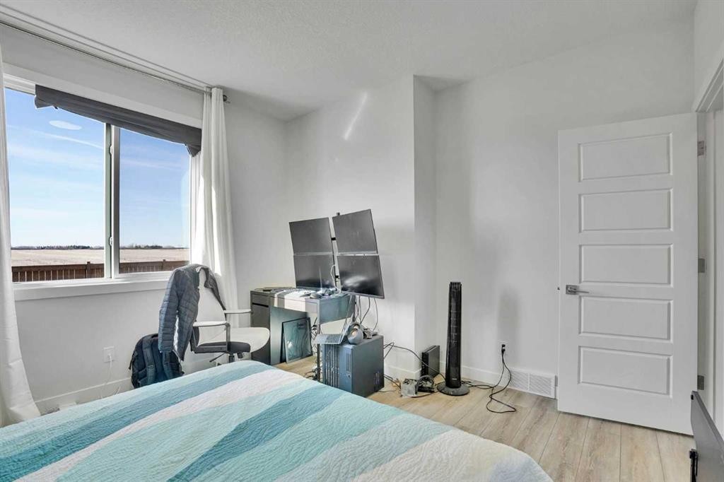 183 Brander Avenue, Langdon, AB - Indoor Photo Showing Bedroom
