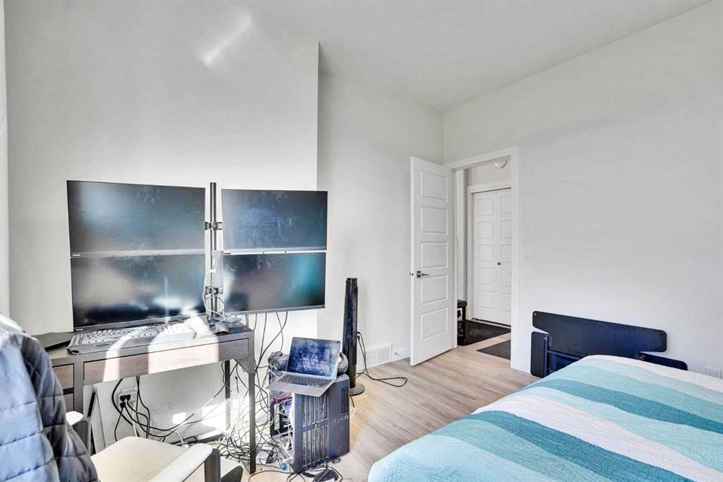 183 Brander Avenue, Langdon, AB - Indoor Photo Showing Bedroom
