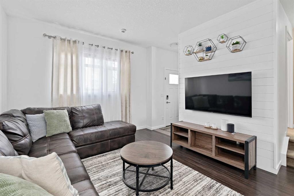 205 Copperstone Park Se, Calgary, AB - Indoor Photo Showing Living Room