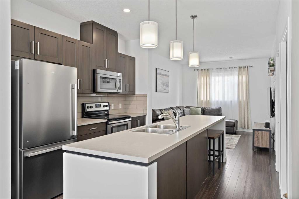 205 Copperstone Park Se, Calgary, AB - Indoor Photo Showing Kitchen With Double Sink With Upgraded Kitchen