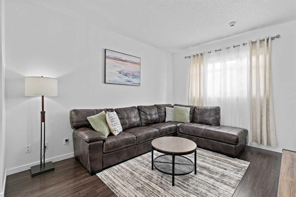 205 Copperstone Park Se, Calgary, AB - Indoor Photo Showing Living Room