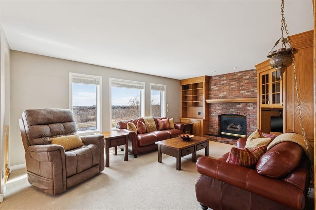 266 Diamond Drive Se, Calgary, AB - Indoor Photo Showing Living Room With Fireplace