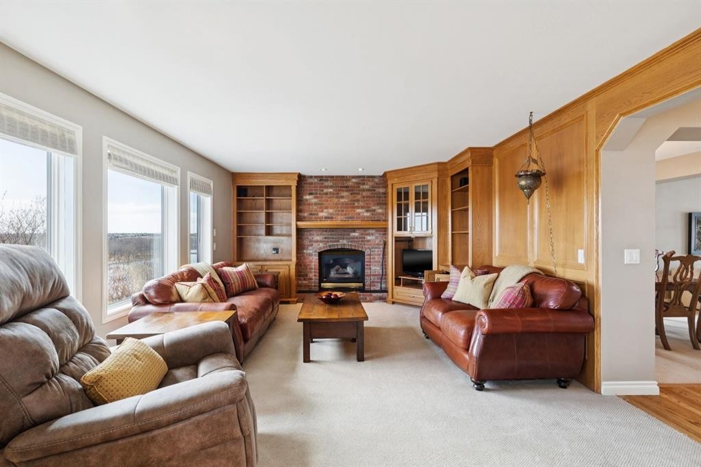 266 Diamond Drive Se, Calgary, AB - Indoor Photo Showing Living Room With Fireplace