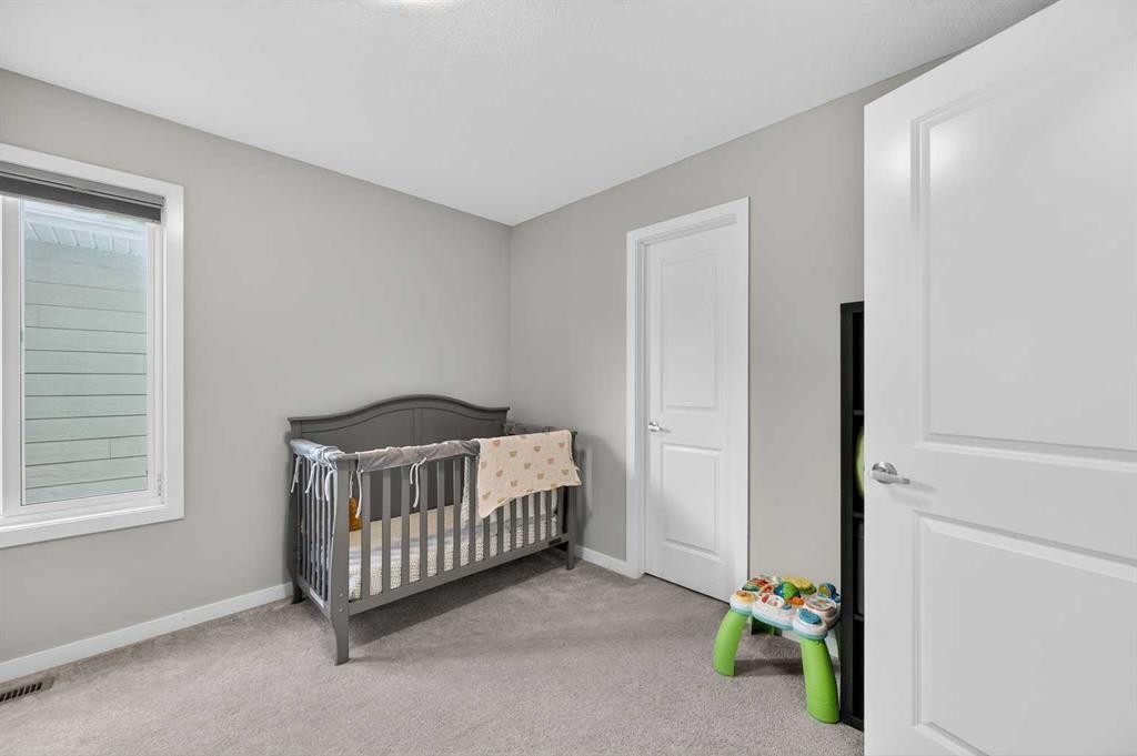 242 Mahogany Passage Se, Calgary, AB - Indoor Photo Showing Bedroom
