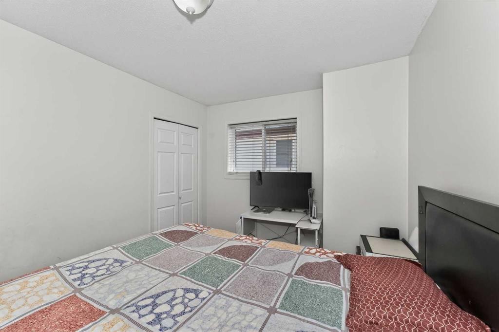119 Taravista Drive Ne, Calgary, AB - Indoor Photo Showing Bedroom