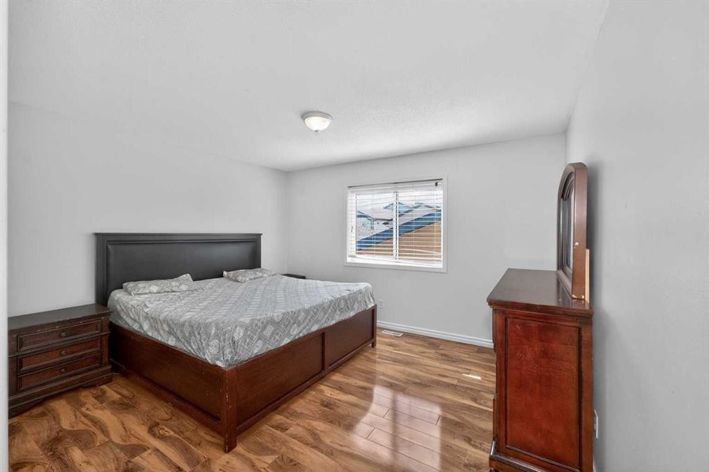 119 Taravista Drive Ne, Calgary, AB - Indoor Photo Showing Bedroom