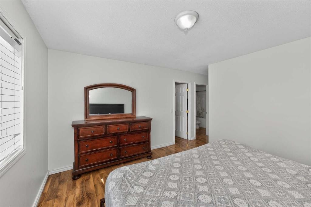 119 Taravista Drive Ne, Calgary, AB - Indoor Photo Showing Bedroom