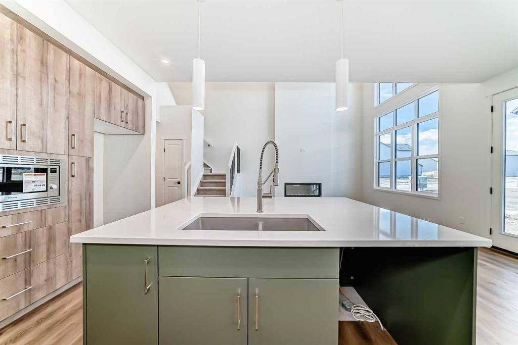 61 Bartlett Way Se, Calgary, AB - Indoor Photo Showing Kitchen With Double Sink With Upgraded Kitchen