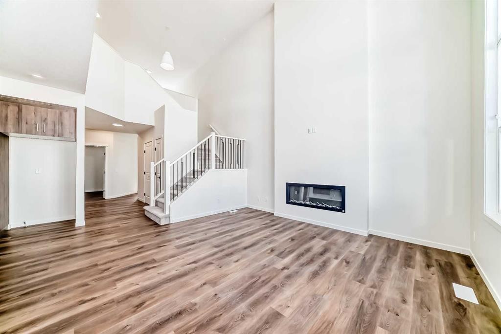 61 Bartlett Way Se, Calgary, AB - Indoor With Fireplace