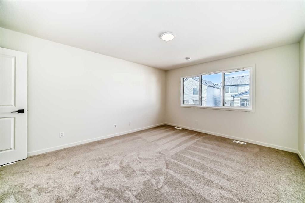 61 Bartlett Way Se, Calgary, AB - Indoor Photo Showing Other Room