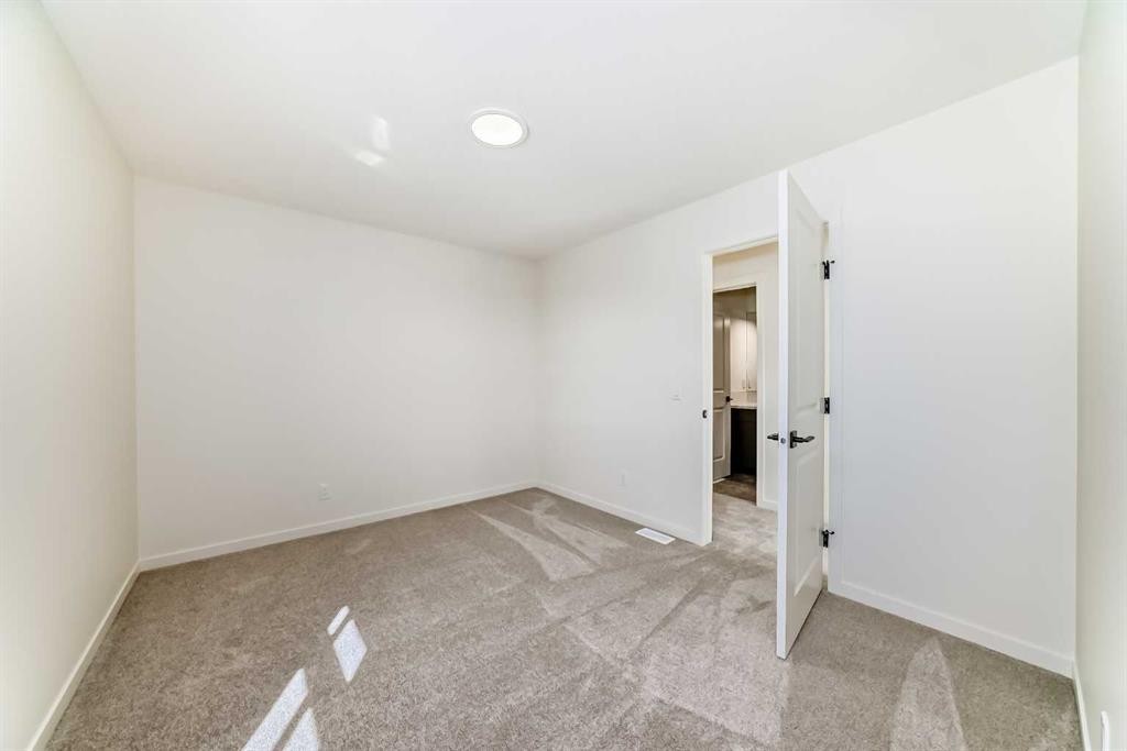 61 Bartlett Way Se, Calgary, AB - Indoor Photo Showing Other Room