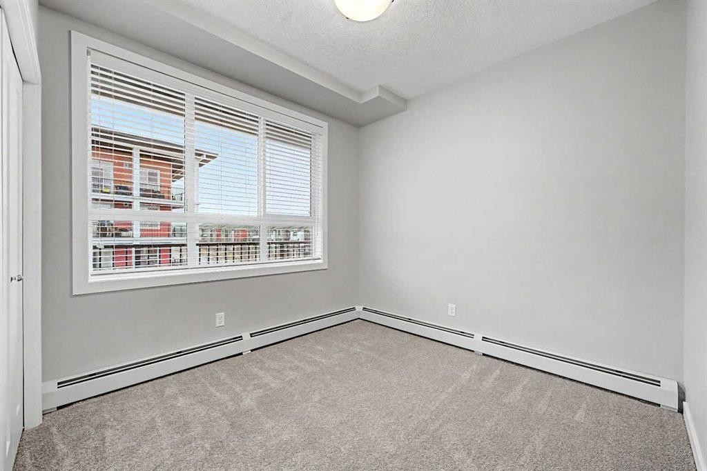304-10 Walgrove Walk Se, Calgary, AB - Indoor Photo Showing Other Room