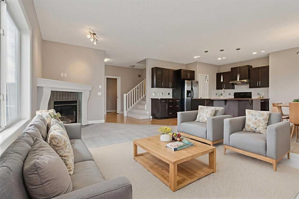 357 Kincora Drive Nw, Calgary, AB - Indoor Photo Showing Living Room With Fireplace