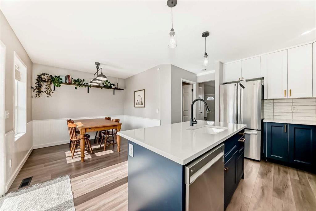 136 Hidden Hills Road Nw, Calgary, AB - Indoor Photo Showing Kitchen With Stainless Steel Kitchen With Upgraded Kitchen