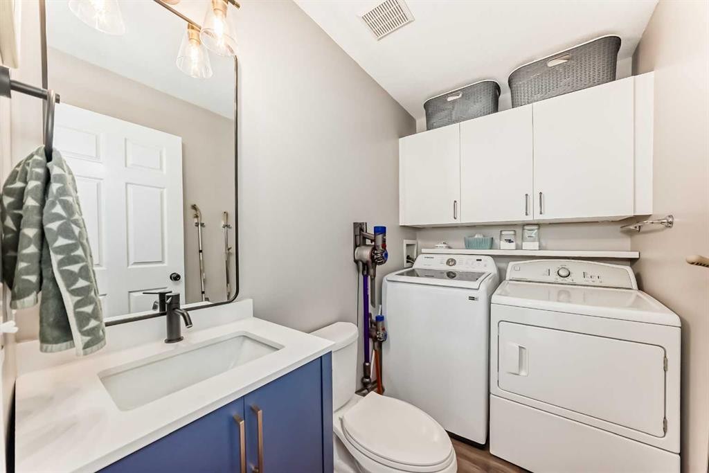 136 Hidden Hills Road Nw, Calgary, AB - Indoor Photo Showing Laundry Room