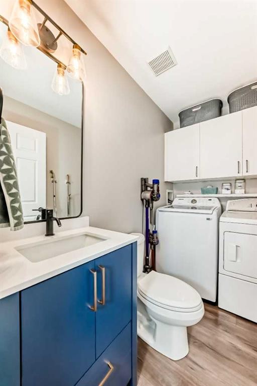 136 Hidden Hills Road Nw, Calgary, AB - Indoor Photo Showing Laundry Room