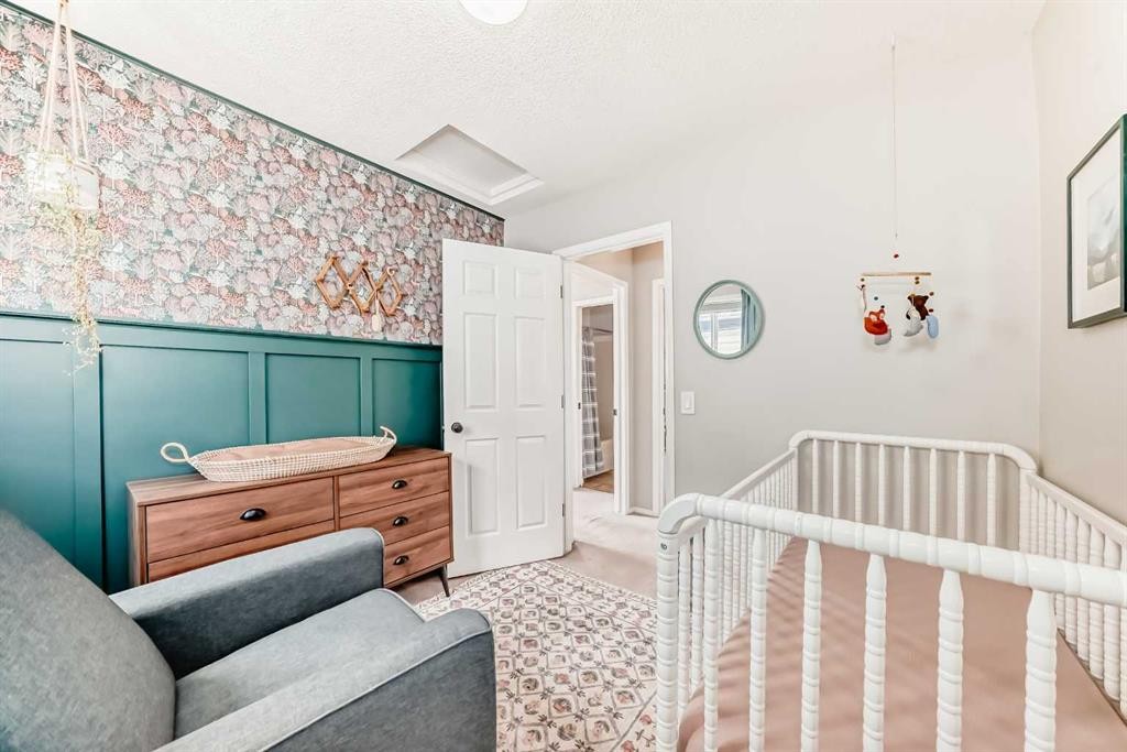 136 Hidden Hills Road Nw, Calgary, AB - Indoor Photo Showing Bedroom