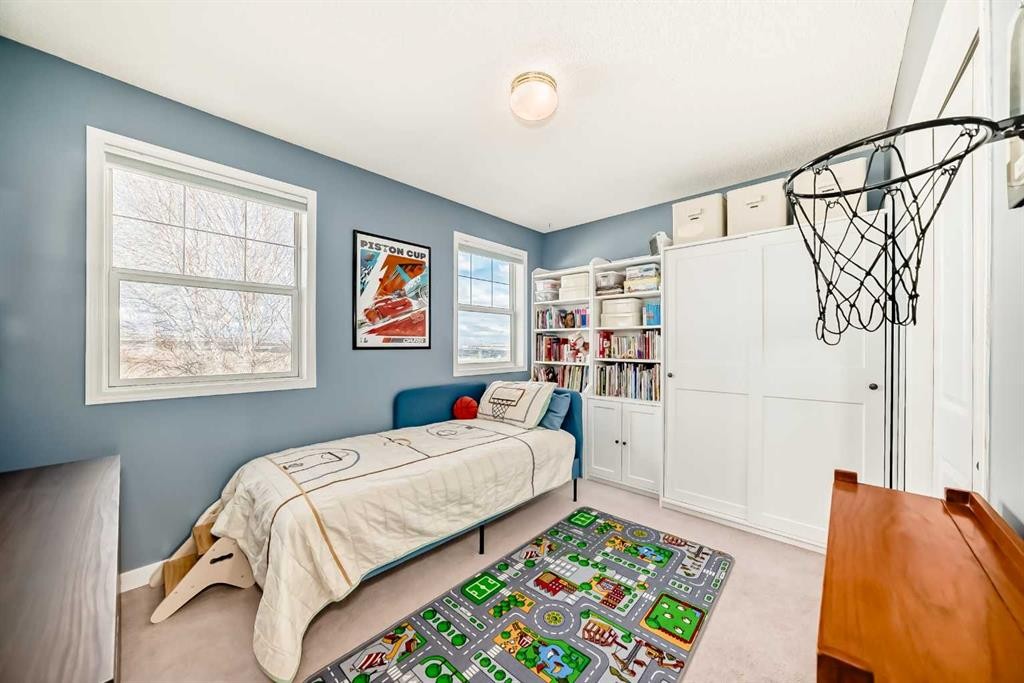 136 Hidden Hills Road Nw, Calgary, AB - Indoor Photo Showing Bedroom