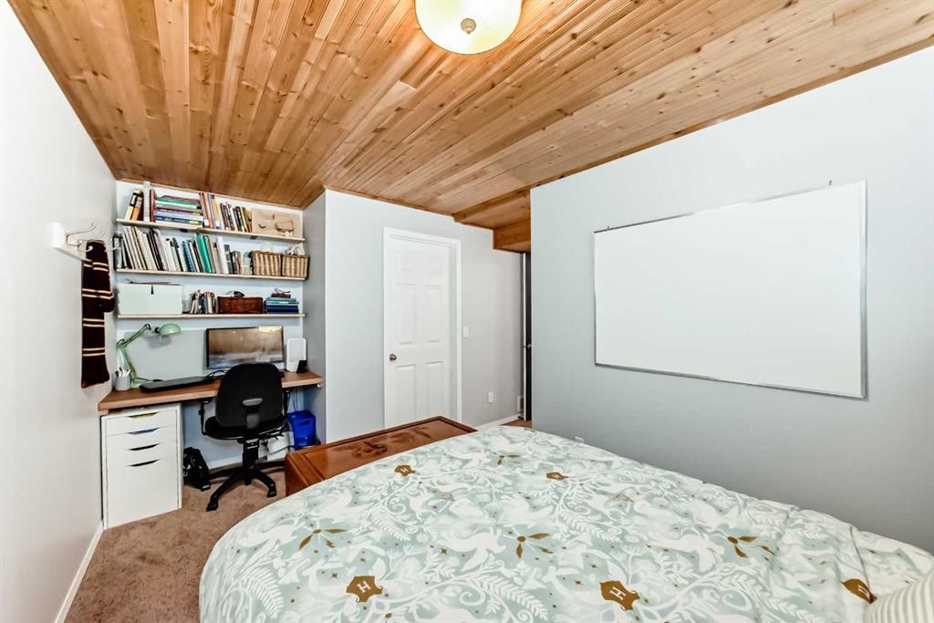 136 Hidden Hills Road Nw, Calgary, AB - Indoor Photo Showing Bedroom