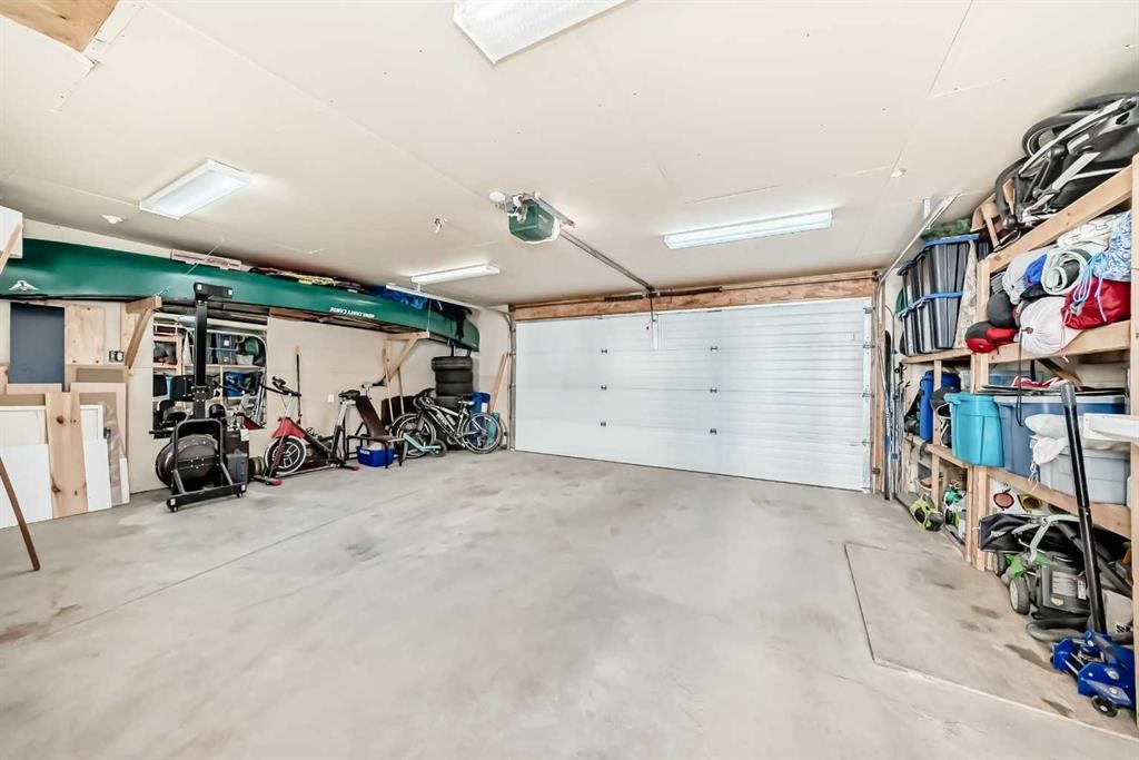 136 Hidden Hills Road Nw, Calgary, AB - Indoor Photo Showing Garage