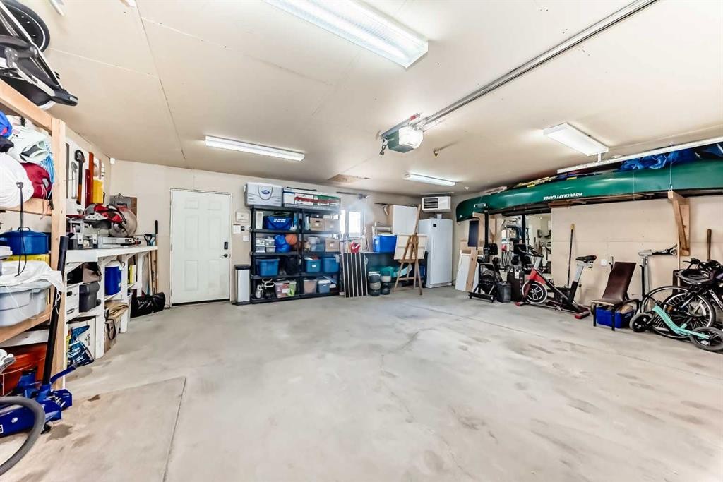 136 Hidden Hills Road Nw, Calgary, AB - Indoor Photo Showing Garage