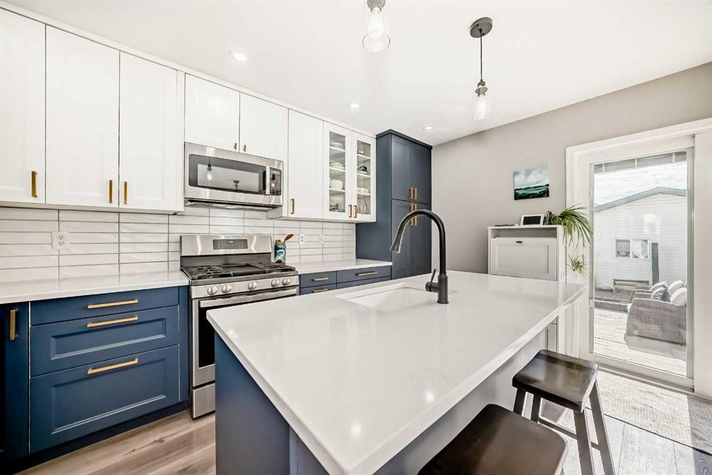 136 Hidden Hills Road Nw, Calgary, AB - Indoor Photo Showing Kitchen With Upgraded Kitchen