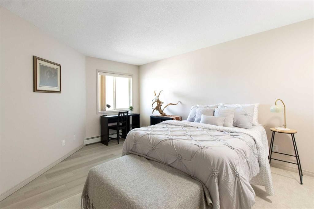 210-3 Parklane Way, Strathmore, AB - Indoor Photo Showing Bedroom
