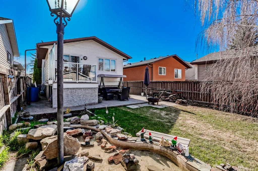 13 Taraglen Road Ne, Calgary, AB - Outdoor With Deck Patio Veranda