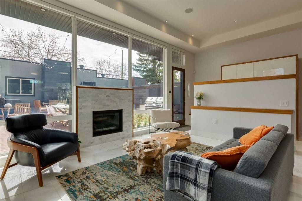 2210 Victoria Crescent Nw, Calgary, AB - Indoor Photo Showing Living Room With Fireplace