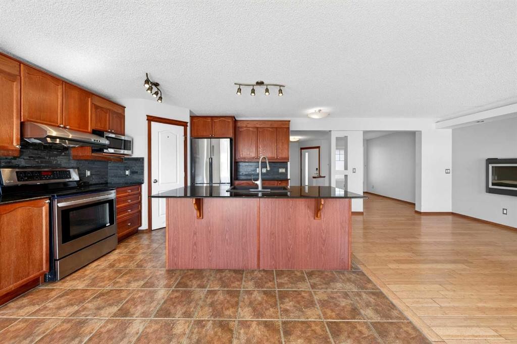 172 Kincora Drive Nw, Calgary, AB - Indoor Photo Showing Kitchen With Stainless Steel Kitchen