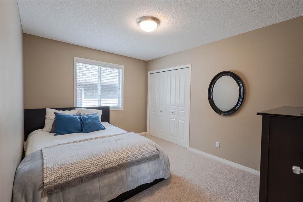 74 Valley Crest Rise Nw, Calgary, AB - Indoor Photo Showing Bedroom