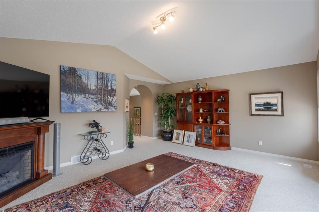 74 Valley Crest Rise Nw, Calgary, AB - Indoor Photo Showing Living Room With Fireplace