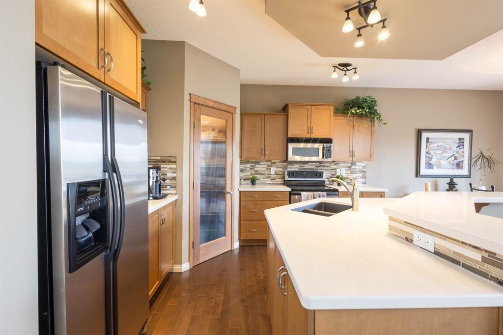 74 Valley Crest Rise Nw, Calgary, AB - Indoor Photo Showing Kitchen With Stainless Steel Kitchen With Double Sink