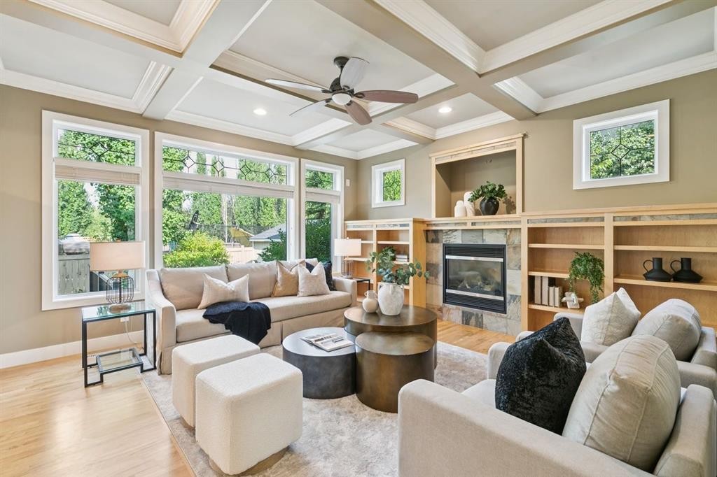 38 Evergreen Common Sw, Calgary, AB - Indoor Photo Showing Living Room With Fireplace