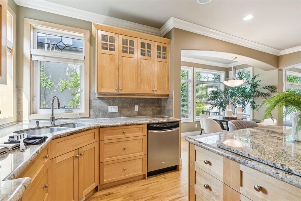 38 Evergreen Common Sw, Calgary, AB - Indoor Photo Showing Kitchen With Double Sink With Upgraded Kitchen