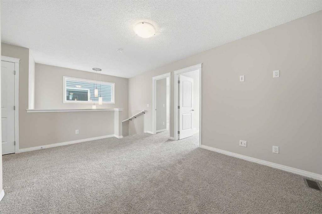 831 Wolf Willow Boulevard Se, Calgary, AB - Indoor Photo Showing Other Room