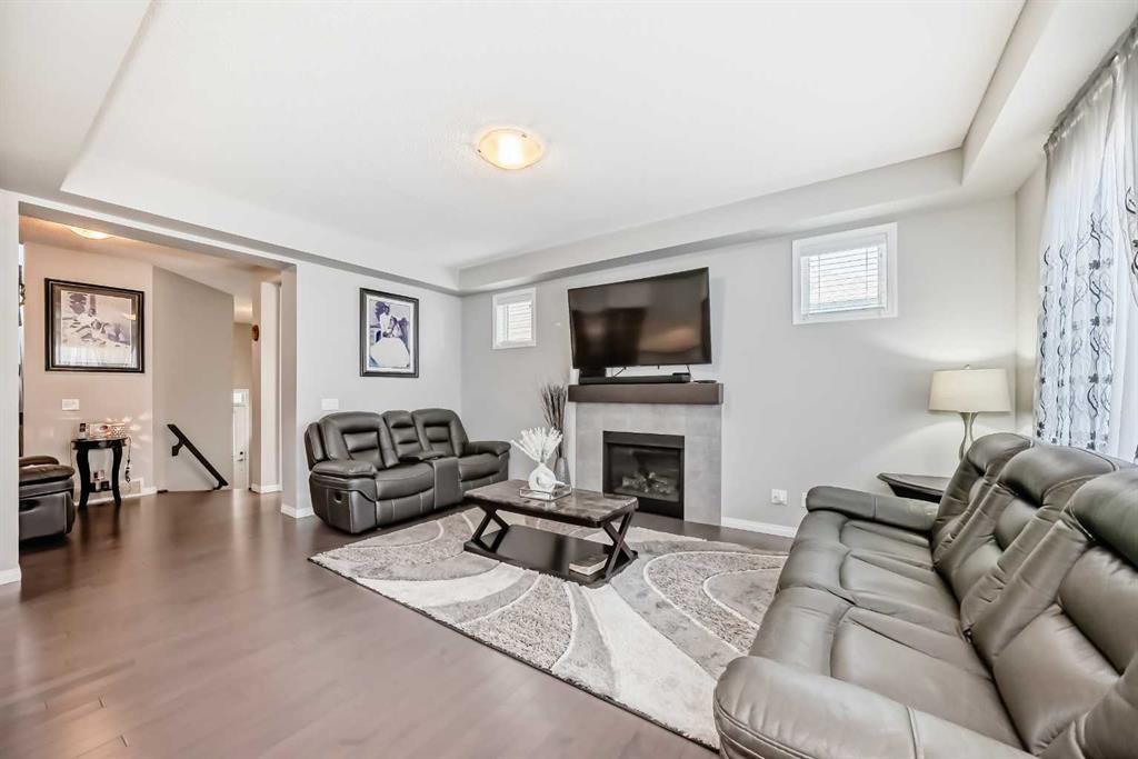 61 Cityscape View Ne, Calgary, AB - Indoor Photo Showing Living Room With Fireplace