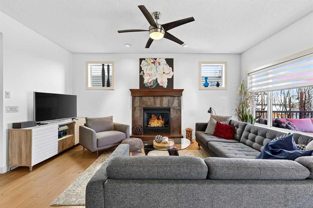 4703 Elgin Avenue Se, Calgary, AB - Indoor Photo Showing Living Room With Fireplace