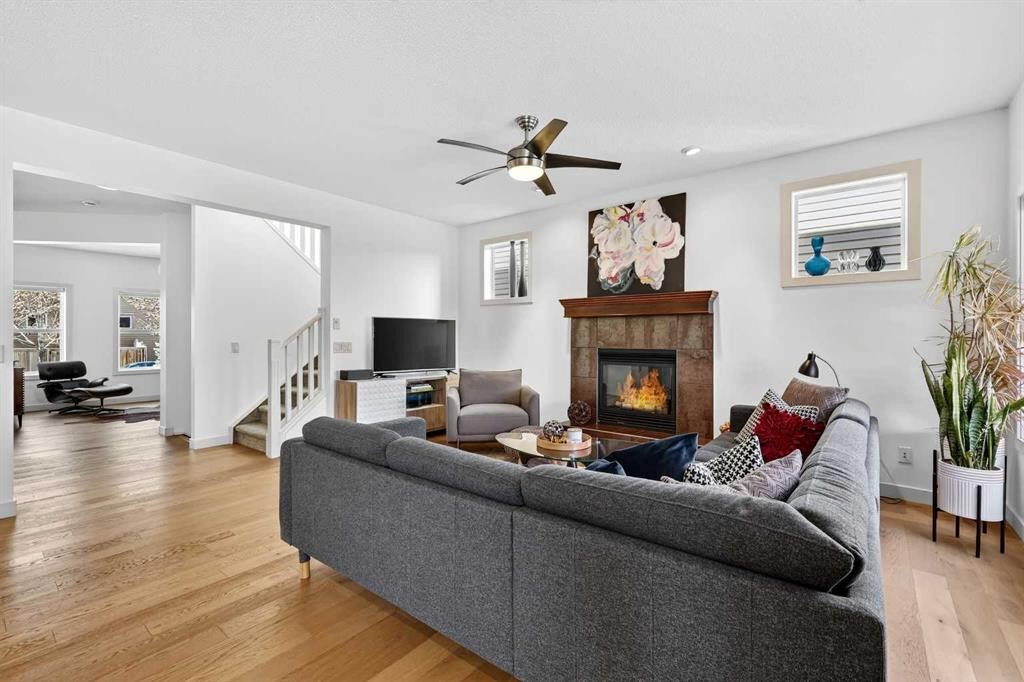 4703 Elgin Avenue Se, Calgary, AB - Indoor Photo Showing Living Room With Fireplace
