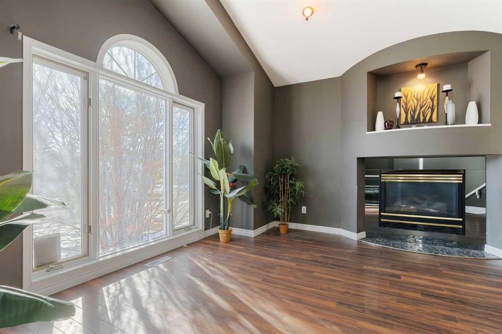 8373 Edgevalley Drive Nw, Calgary, AB - Indoor Photo Showing Living Room With Fireplace