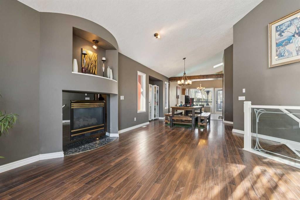 8373 Edgevalley Drive Nw, Calgary, AB - Indoor Photo Showing Living Room With Fireplace