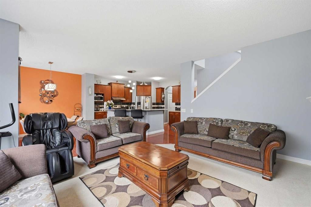 61 Saddleland Drive Ne, Calgary, AB - Indoor Photo Showing Living Room