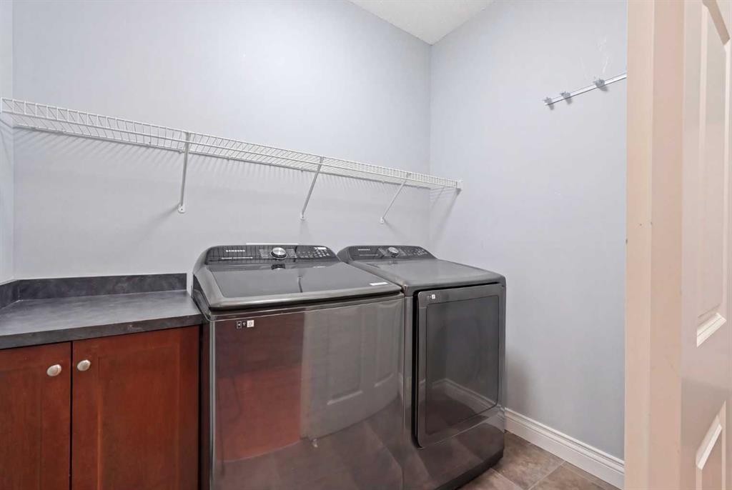 61 Saddleland Drive Ne, Calgary, AB - Indoor Photo Showing Laundry Room