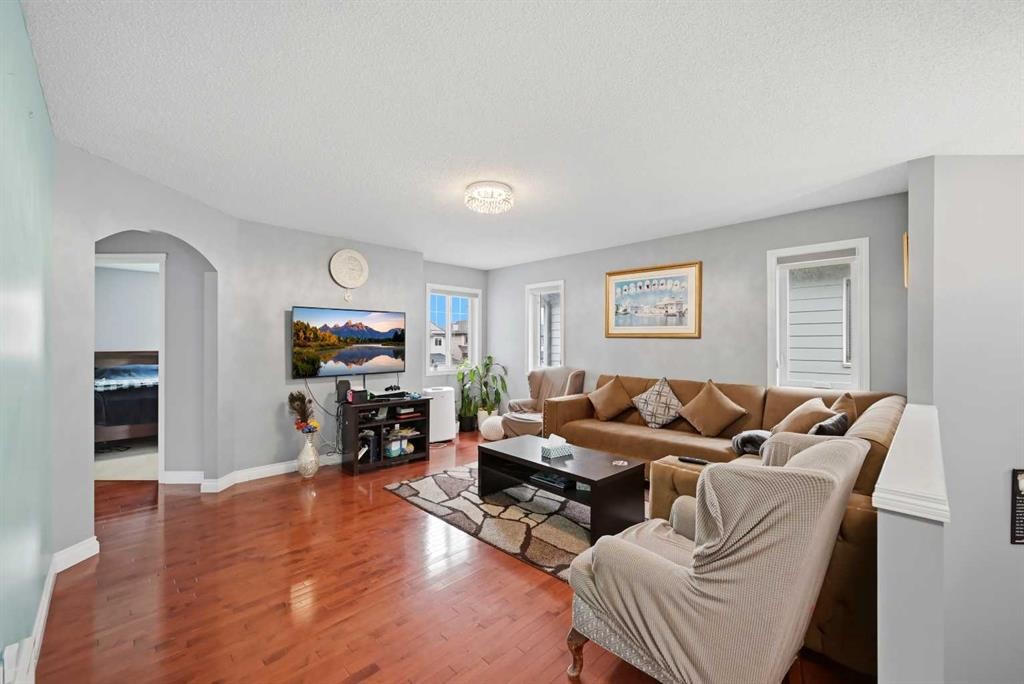 61 Saddleland Drive Ne, Calgary, AB - Indoor Photo Showing Living Room