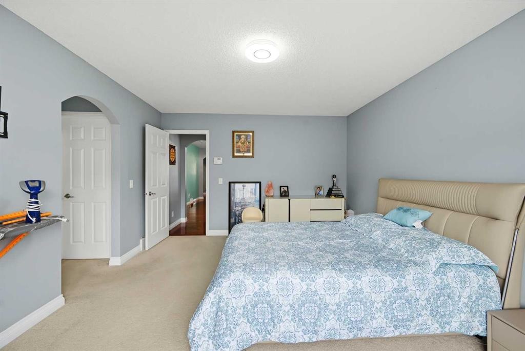 61 Saddleland Drive Ne, Calgary, AB - Indoor Photo Showing Bedroom