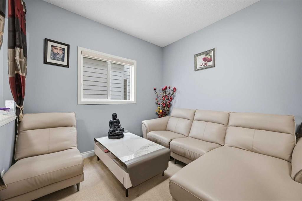 61 Saddleland Drive Ne, Calgary, AB - Indoor Photo Showing Living Room