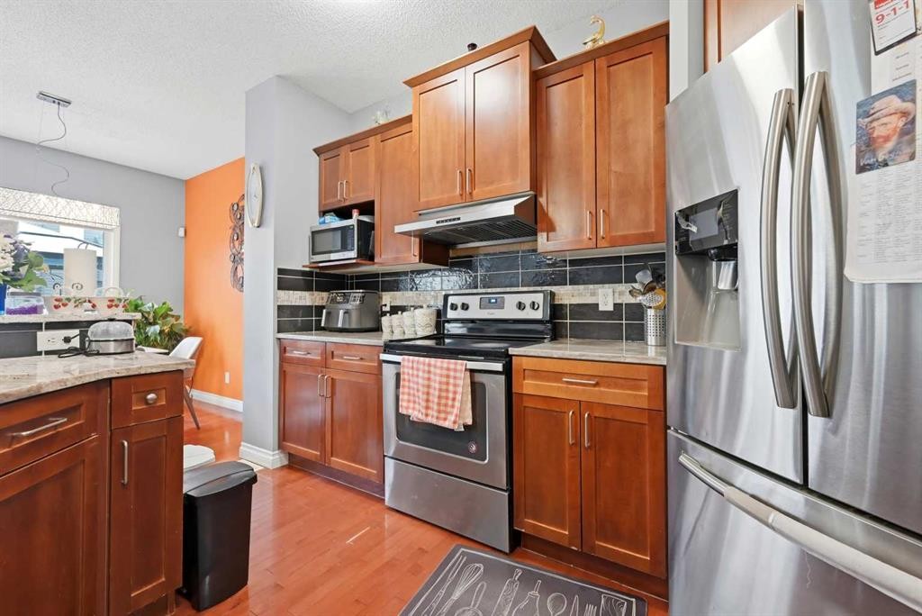 61 Saddleland Drive Ne, Calgary, AB - Indoor Photo Showing Kitchen