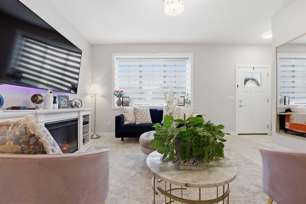1053 West Lakeview, Chestermere, AB - Indoor Photo Showing Living Room With Fireplace